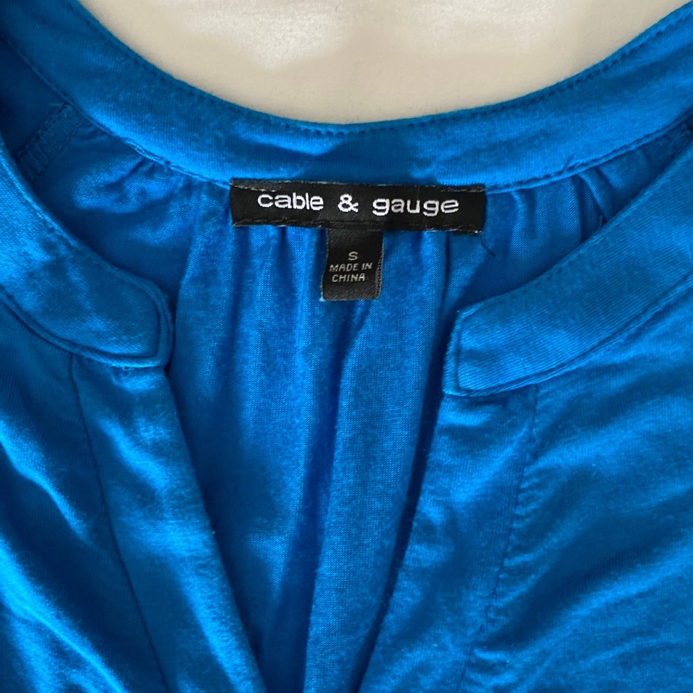 Blue sleeveless blouse. Size S